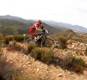 a bike cyclist following his training plan